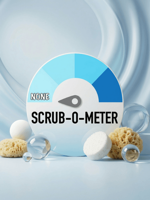Product display featuring a circular gauge meter labeled 'SCRUB-O-METER' with pointer at 'NONE', surrounded by natural sea sponges, white bath bombs, and glass spheres on a light blue background.